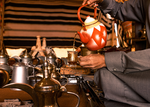 Serving tea, Saudi Arabia